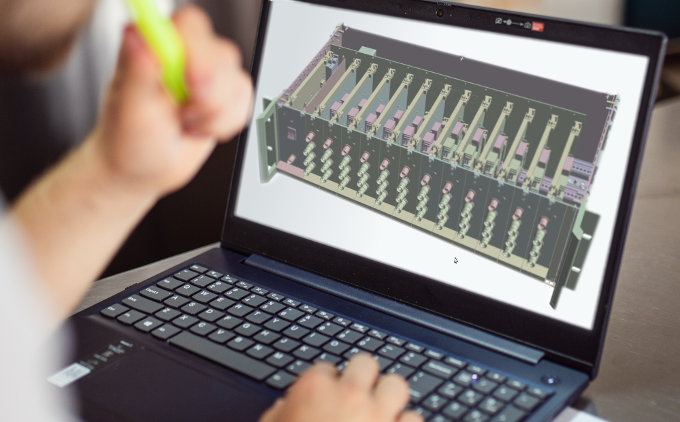 CAD drawing of a signal switch AMXR on a laptop